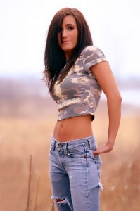 Pretty young Native American woman in blue jeans